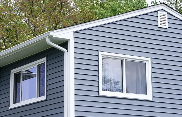 Fiber cement lap siding installed with corner boards and trim